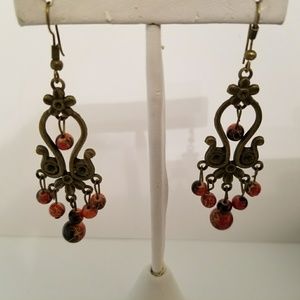 Brand new chandelier earrings, red stone